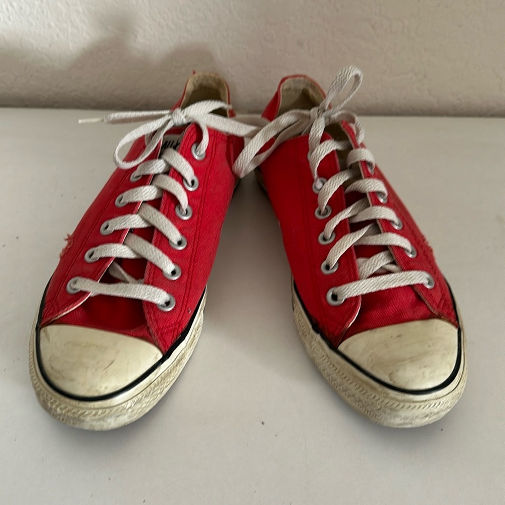 Size 7 Men’s/ 9 Woman’s Converse All Star distressed red shoes. Hardly worn.
